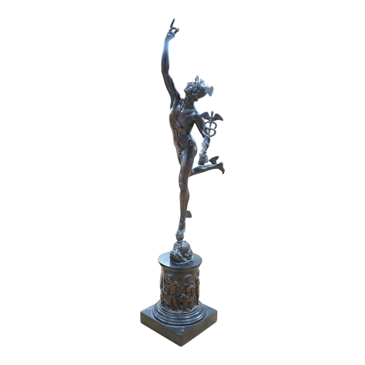 A late 19th / early 20th century Grand Tour style bronze study of Mercury raised on a circular column base, 87cm high. Condition - small chips to black slate plinth otherwise in good condition